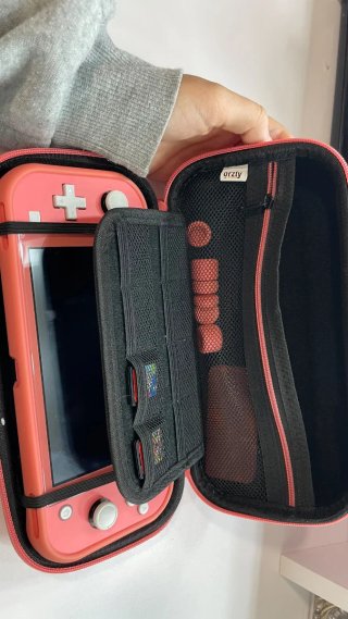 Nintendo Switch Lite Rosa  y 2 juegos