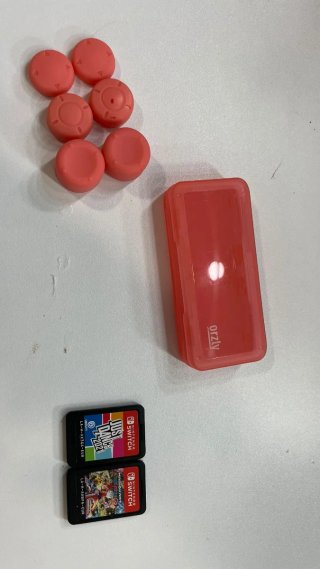 Nintendo Switch Lite Rosa  y 2 juegos
