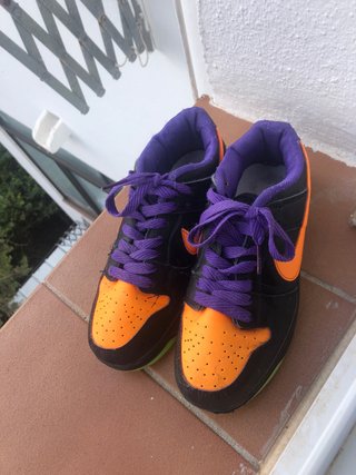 Zapatillas Nike niño negras/naranja/morado