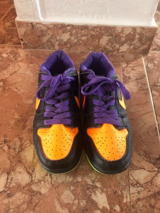 Zapatillas Nike niño negras/naranja/morado