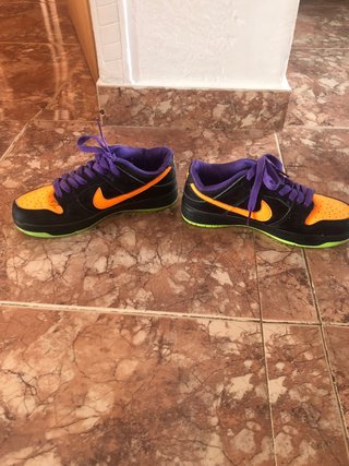 Zapatillas Nike niño negras/naranja/morado