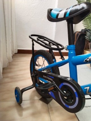 Bicicleta infantil 16 con ruedines y cesta