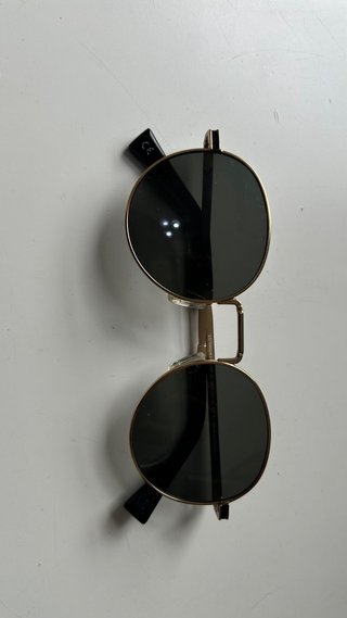 Gafas de sol Hawkers negras y doradas
