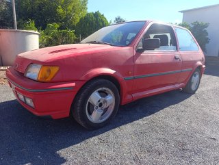 ford fiesta rs turbo y otro