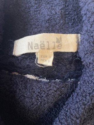 Jersey de punto azul marino con rayas blancas