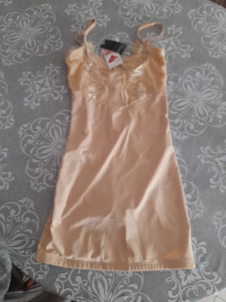 Combinación femenina beige