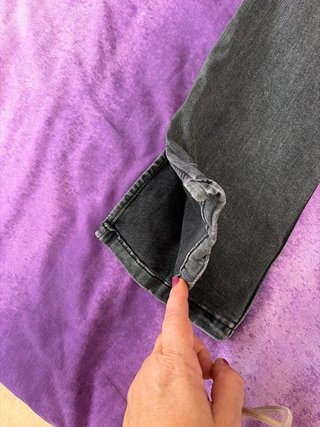 Pantalones flare negro efecto desgastado
