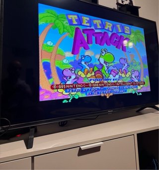 Super Nintendo con juegos y mando
