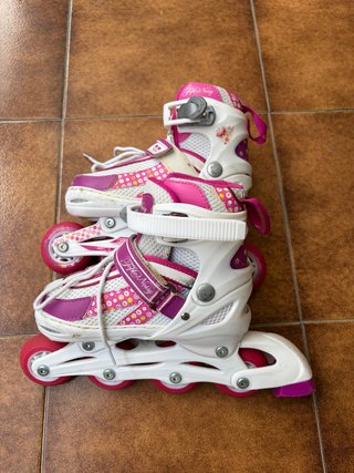 Patines infantiles rosas y blancos