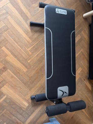 Lote Pesas Domyos 10kg con banco de abdominales .
