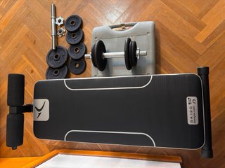 Lote Pesas Domyos 10kg con banco de abdominales .