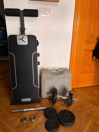 Lote Pesas Domyos 10kg con banco de abdominales .