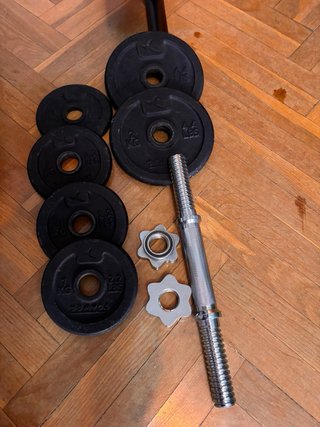 Lote Pesas Domyos 10kg con banco de abdominales .