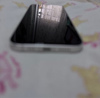 iPhone 12 128 GB blanco – 86% batería – con funda