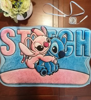 Regalo alfombra Stitch con compras