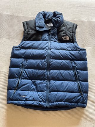 Chaleco The North Face azul y negro Talla S