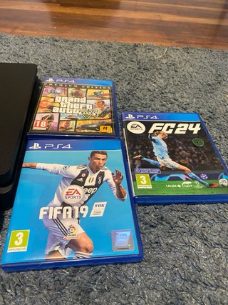 PS4 Slim 500GB + Mando + 3 Juegos (FC24, GTA V)