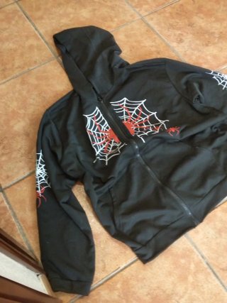 Sudadera con cremallera y estampado de araña