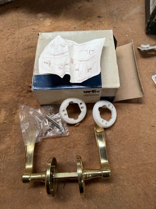 Manivela de puerta Urfic dorada