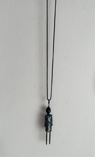 Colgante con figura decorativa