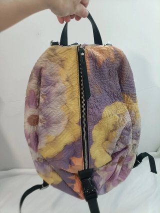 Mochila Desigual multicolor con bolsillo