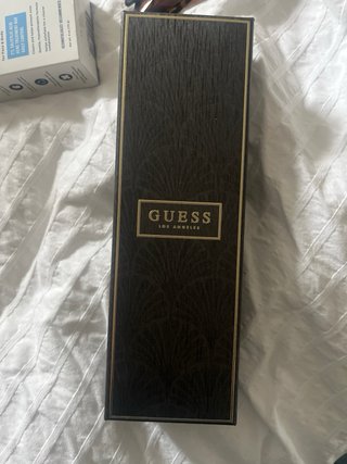 Conjunto de Colgante y Pendientes Guess