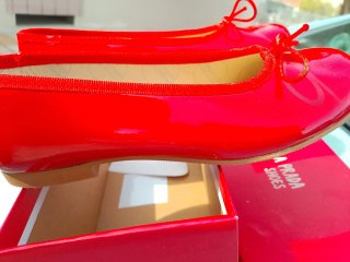 Zapatos planos Prada rojos