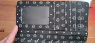 Monedero Spirit Board Negro y Plateado.