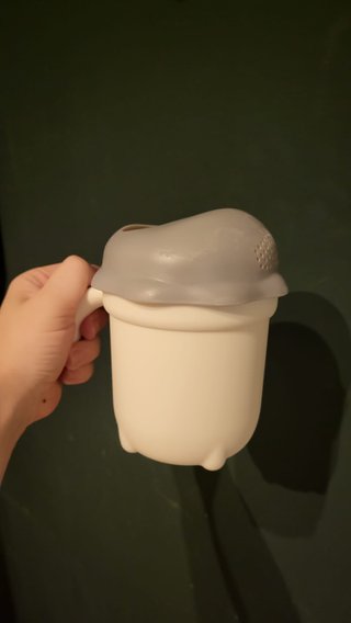 Bañera plegable de bebé + jarra de aclarado