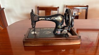 Máquina de coser Singer antigua manivela