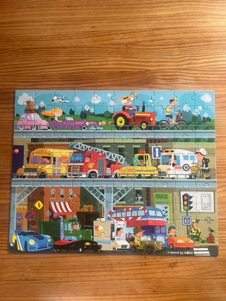Puzzle 100 pzs ciudad y vehiculos Janod.
