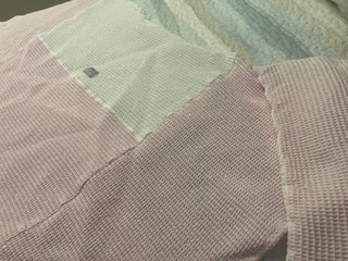 Colcha cuna Don Algodón rosa y blanca