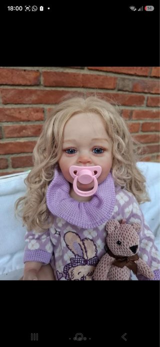 Muñeca Bebé Reborn con Peluche