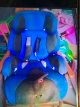 Silla de coche infantil azul y negra