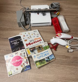 Consola Wii + 2 mandos + 4 juegos