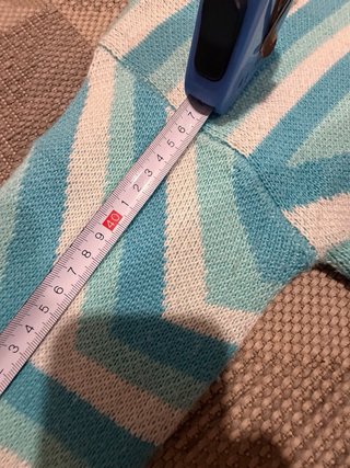 jersey de punto azul con estrellas