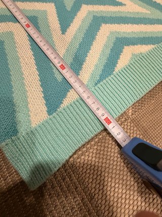 jersey de punto azul con estrellas