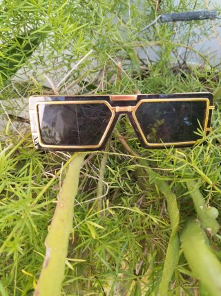 Gafas de sol retro años 80 doradas