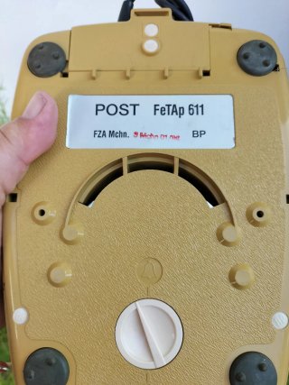 Teléfono antiguo W Germany amarillo