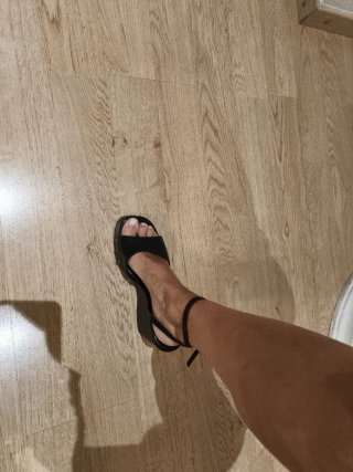 Zapatos de cuña negros de piel.