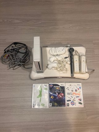 Consola Nintendo Wii con Mandos y Juegos