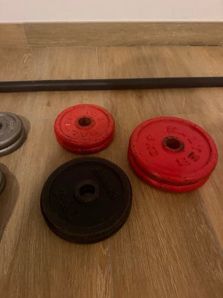Juego de pesas y barra