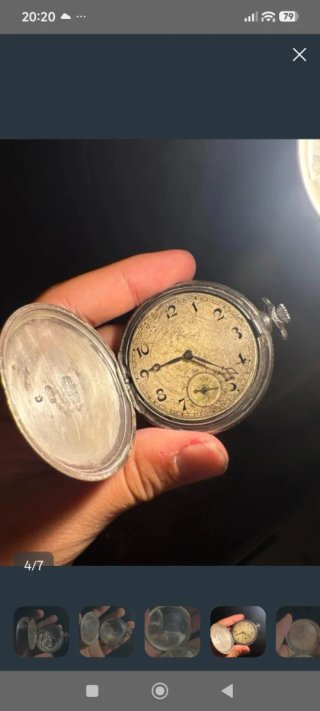 Reloj de bolsillo antiguo de plata