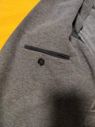Americana gris hombre