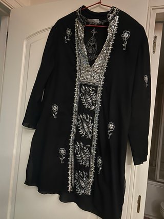 Camisola negra con lentejuelas