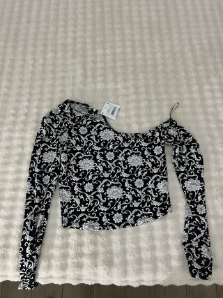 Top estampado floral manga larga