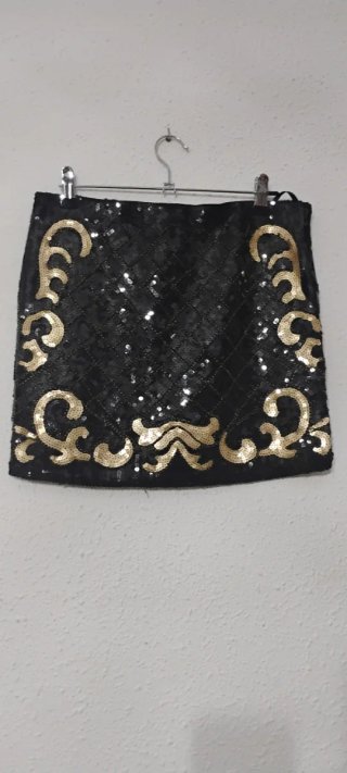 Falda corta lentejuelas negra y dorada talla M/L