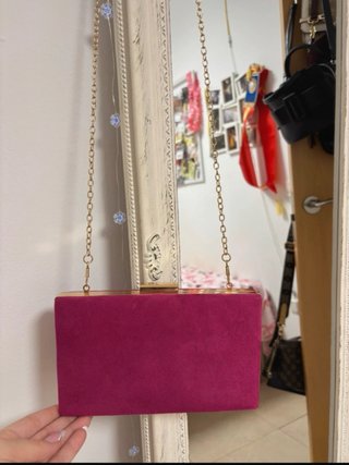 Bolso de mano tipo clutch rosa fucsia