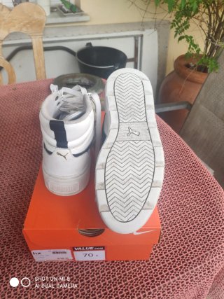 Zapatillas Puma altas blancas y negras