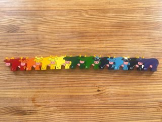 Puzzle Numérico de madera vacas de colores.